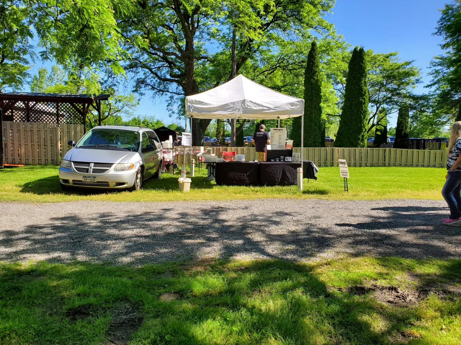Falanga's pop-up tent at the Avon Flea Market on a sunny morning